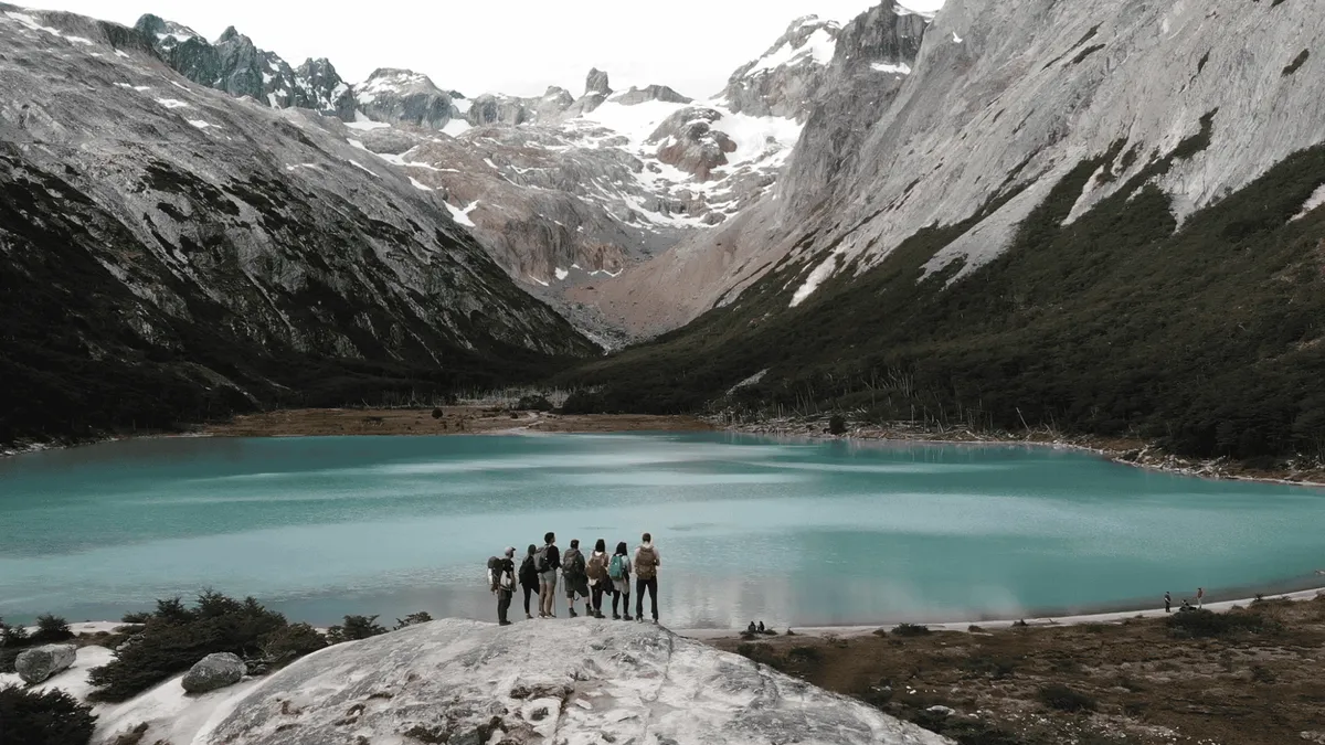 Emerald coloured water of Laguna Esmeralda ringed by the serrated Carbajal range near Ushuaia, Argentina